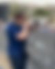 A man with 3 cameras