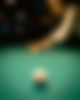 A white ball at the Billard table