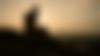 A view at Barcelona with a statue at sunset.